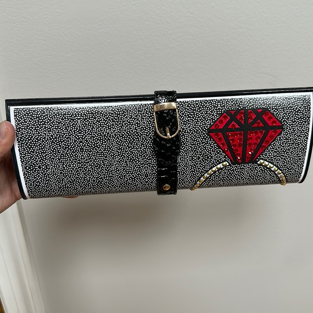Peach Carr hard shell clutch